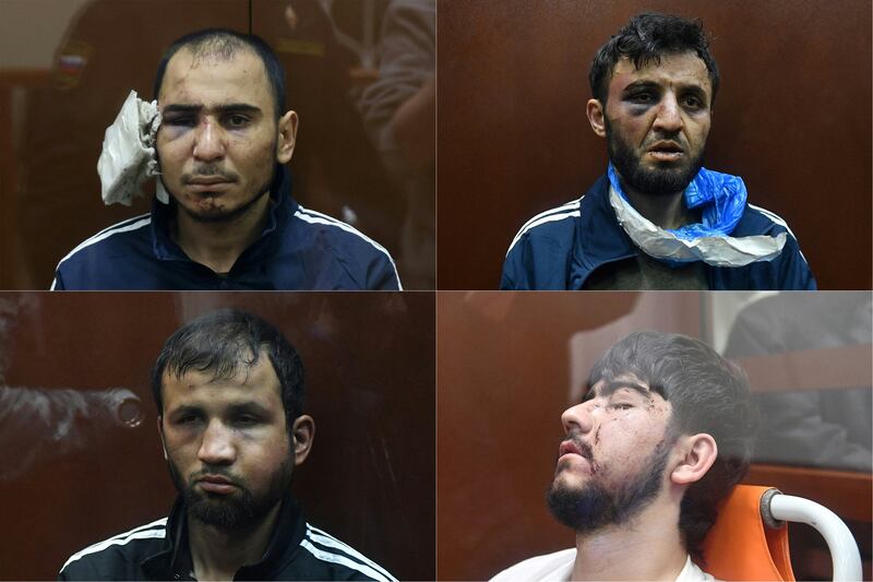 Clockwise from top: Rachabalizoda Saidakrami, Dalerdjon Barotovich Mirzoyev, Muhammadsobir Fayzov and Shamsidin Fariduni, suspected of taking part in the concert hall attack, before a pre-trial detention hearing. Photograph: Tatyana Makeyevaolga Maltseva/AFP via Getty Images