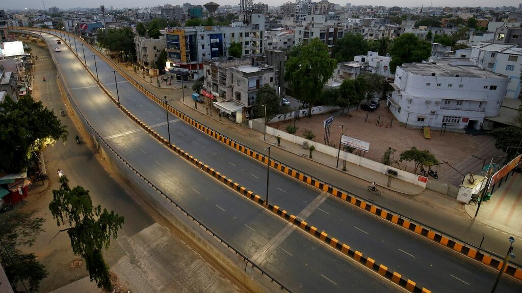 Empty roads during a lockdown to limit the spread of the coronavirus in Ahmedabad, India. Photograph: Amit Dave/Reuters
