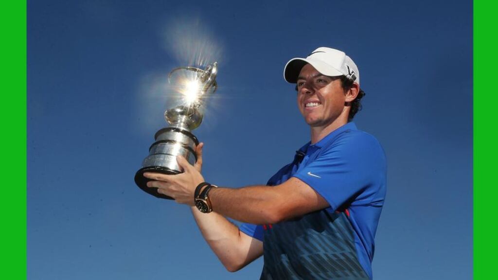 Rory McIlroy with the Australian Open trophy after victory at Royal Sydney Golf Club yesterday. Photograph: Mark Metcalfe/Getty Images