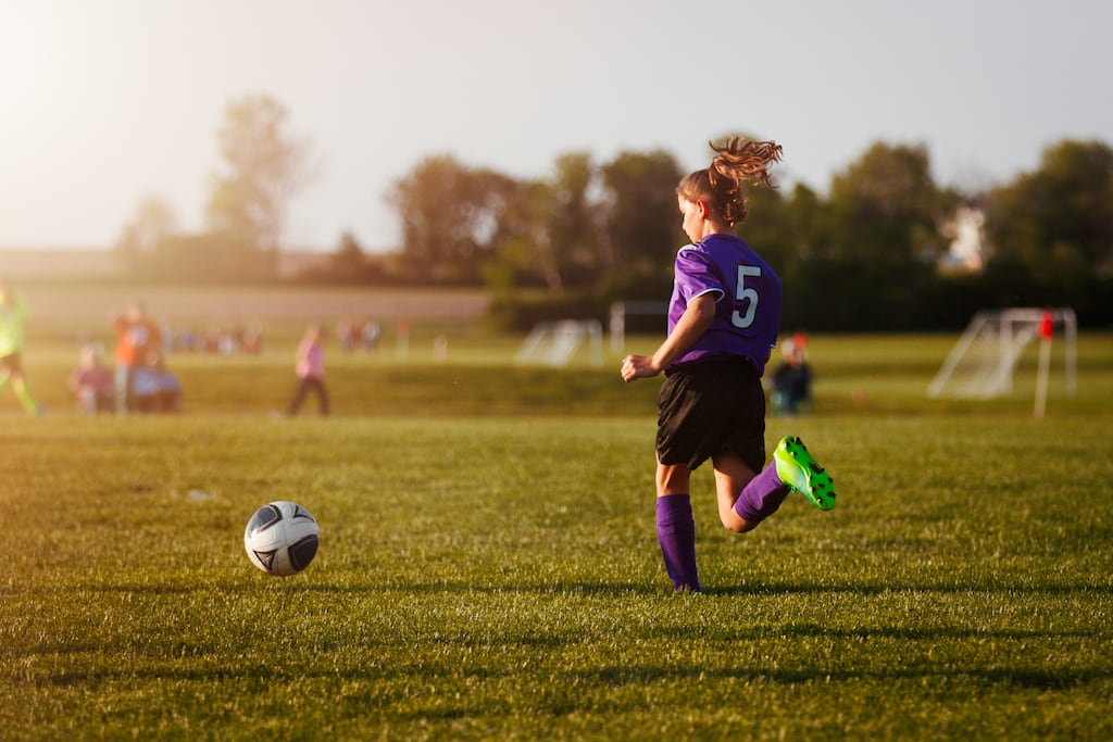 Girls remain less likely to play sports than boys at age 9, the report found. Photograph: Getty Images