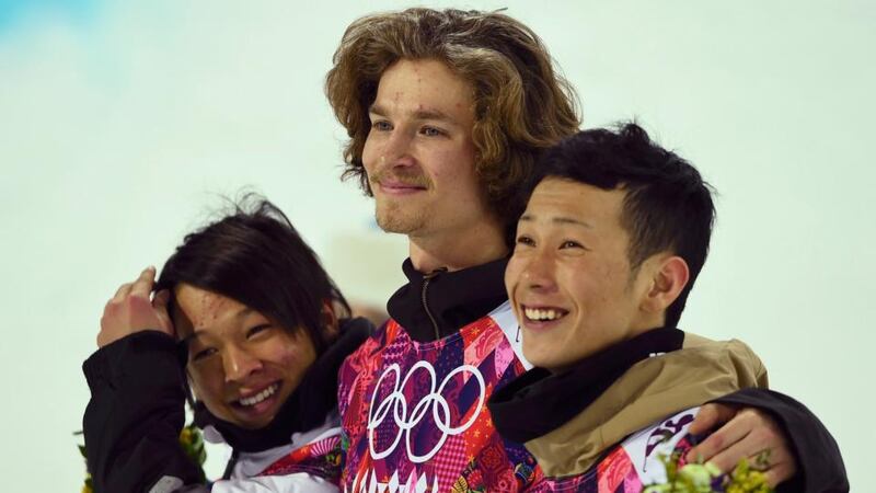 Japan’s Ayumu Hirano (left), who finished in second place, Switzerland’s Iouri Podladtchikov (centre), who finished first and Japan’s Taku Hiraoka, who placed third, pose after the men’s half-pipe snowboarding competition at the 2014 Sochi Winter Olympic Games in Rosa Khutor. Photograsph: Dylan Martinez/Reuters
