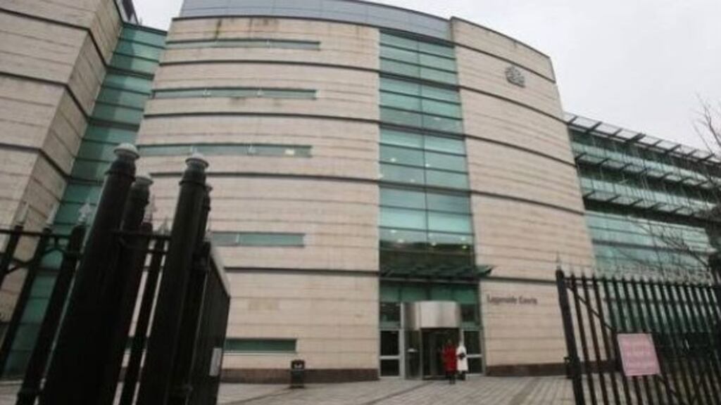 The children’s father, giving evidence at the Antrim Crown Court murder trial for the second day, also wept at the seven second clip.