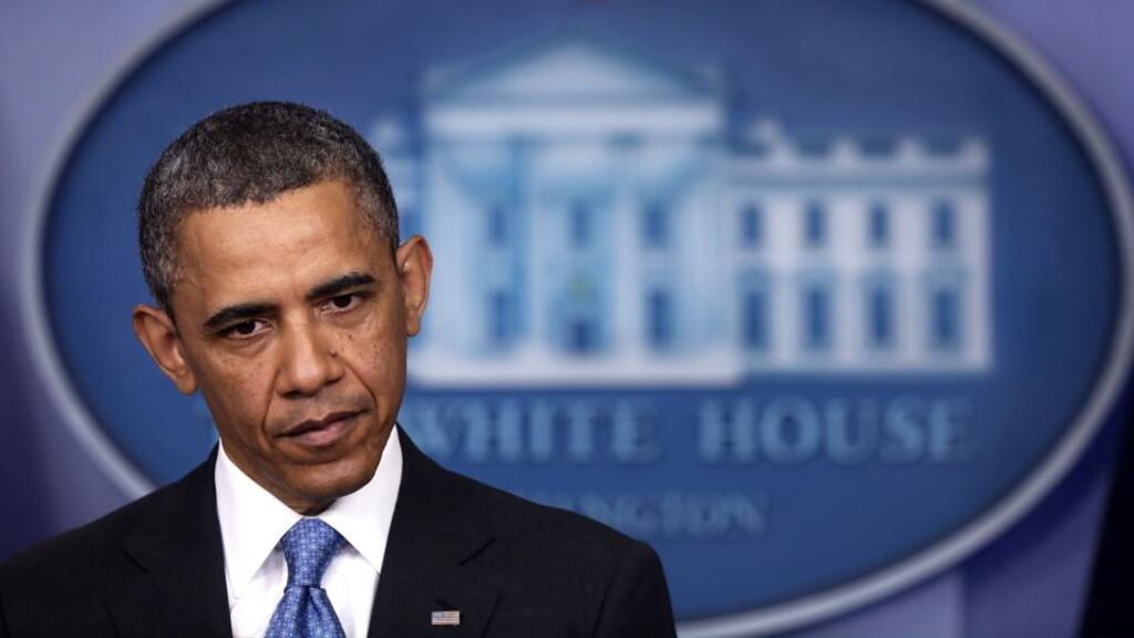 President Barack Obama  during a press conference in the  White House yesterday during which he  answered questions on various issues including the current situation in Syria. Photograph:  Alex Wong/Getty Images