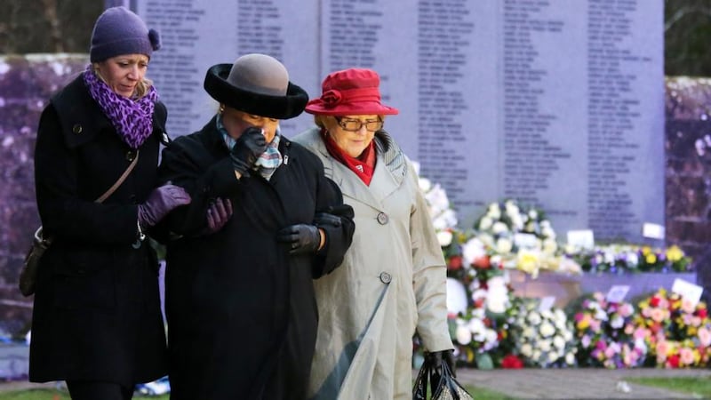 Jane Schultz (centre), mother of Thomas Schultz, after laying flowers at the wall of remembrance after a memorial service to mark the 25th anniversary of the Lockerbie bombing at the memorial site at Dryfesdale cemetery in Lockerbie. Photograph: Andrew Milligan/PA Wire