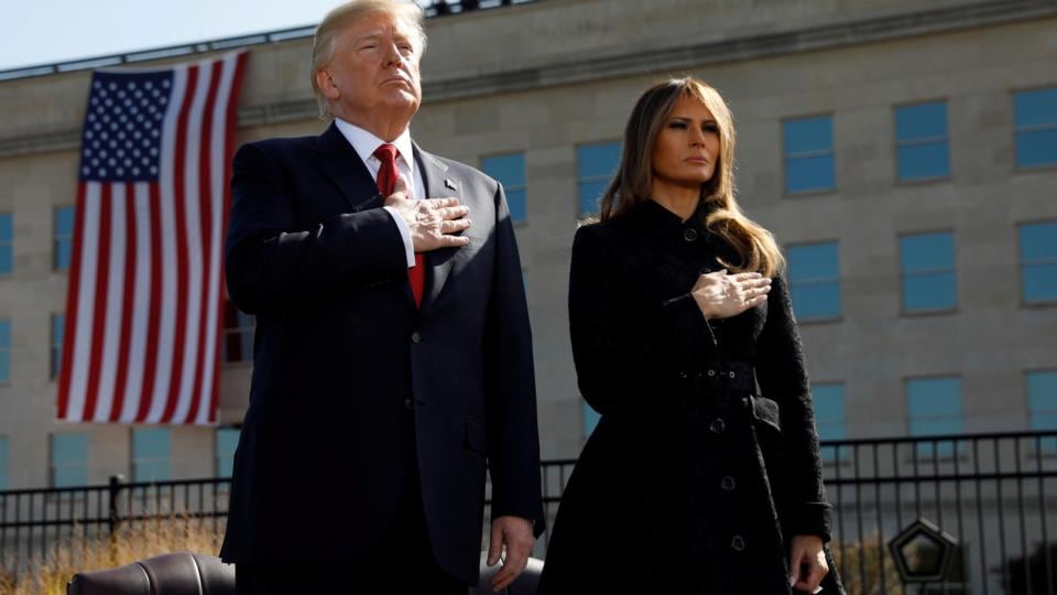 US president Donald Trump and First Lady Melania Trump attend the 9/11 observance in Arlington, Virginia. Photograph: Kevin Lamarque/Reuters