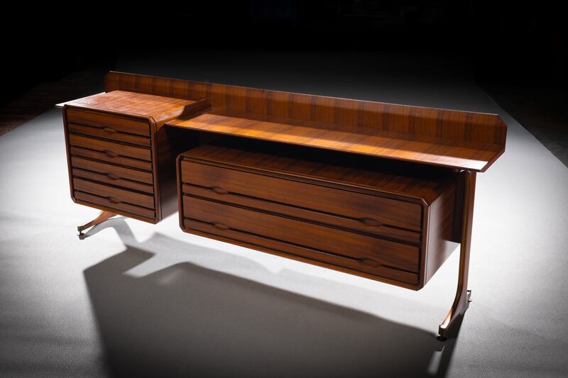 1960s Italian rosewood side cabinet with floating drawers and shelves