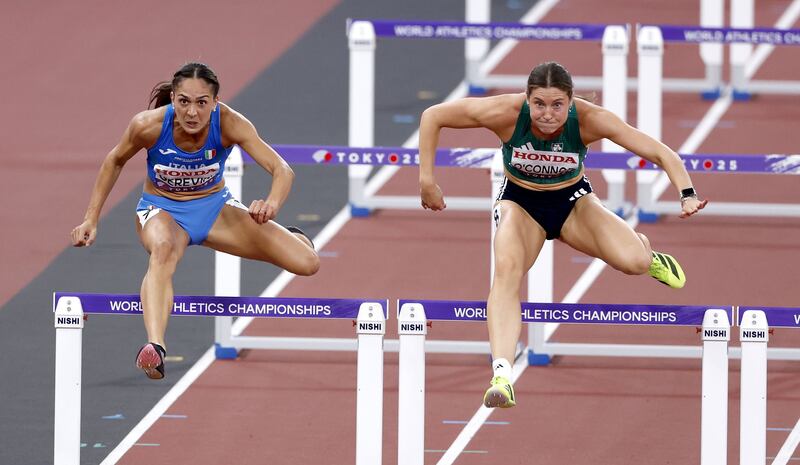 Sveva Gerevini of Italy and Kate O'Connor of Ireland in their 100m hurdles heat. Photograph: Kiyoshi Ota