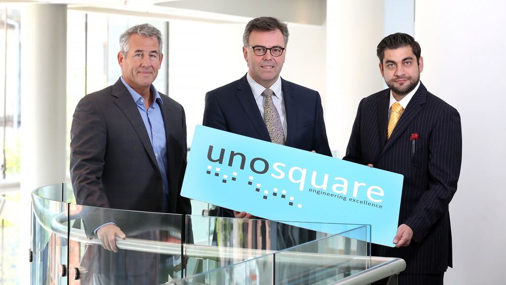 Unosquare chief executive Mike Barrett, Invest Northern Ireland chief executive Alastair Hamilton and Unosquare president Giancarlo di Vece.