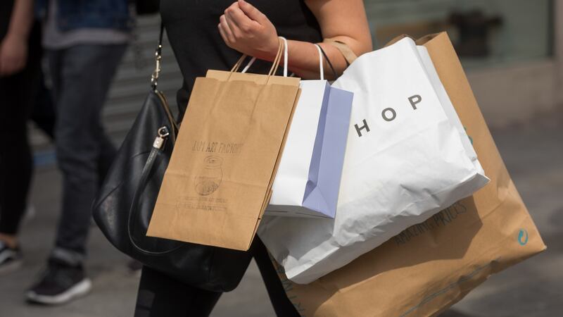 Many of the expectations a middle class family might have – ie foreign holidays, two cars, own their own home – now need two incomes to achieve. Photograph: Jason Alden/Bloomberg via Getty Images