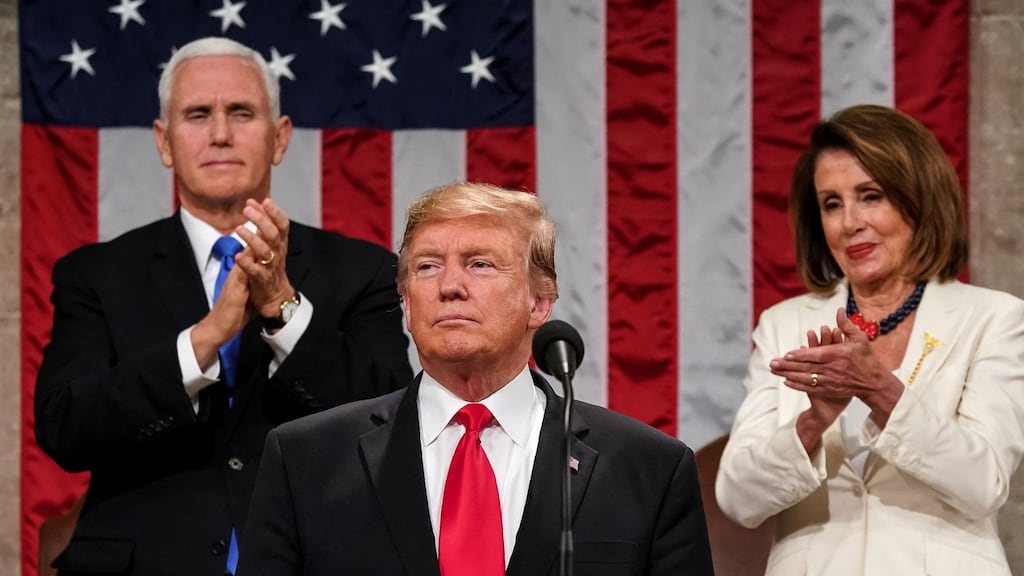 US vice-president Mike Pence and House speaker Nancy Pelosi flank Donald Trump as the US president delivers his State of the Union address at the US Capitol in Washington. Photograph: Doug Mills/AFP/Getty Images