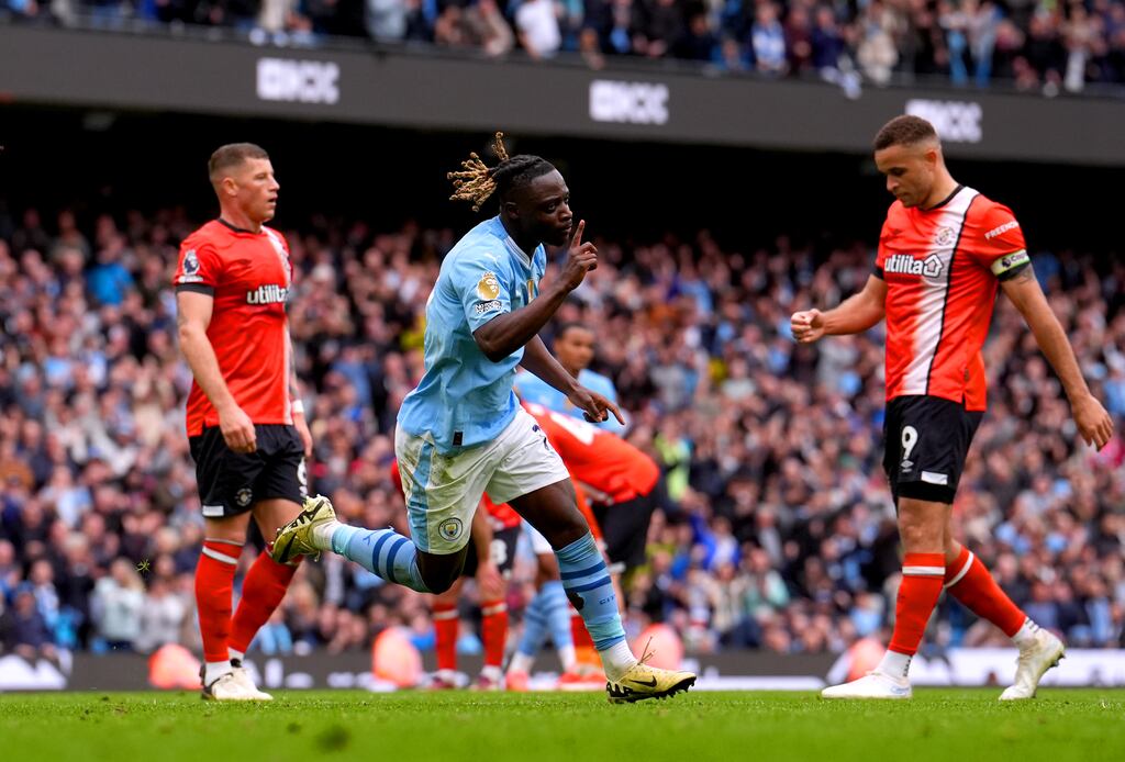 Manchester City's Jeremy Doku celebrates scoring his side's fourth goal during the Premier League match against Luton Town at the Etihad Stadium. Photograph: Martin Rickett/PA Wire