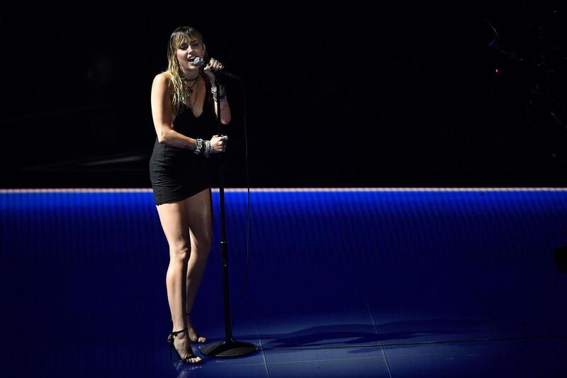 Miley Cyrus performs on stage during the ceremony. Photograph: Angela Weiss/AFP/Getty