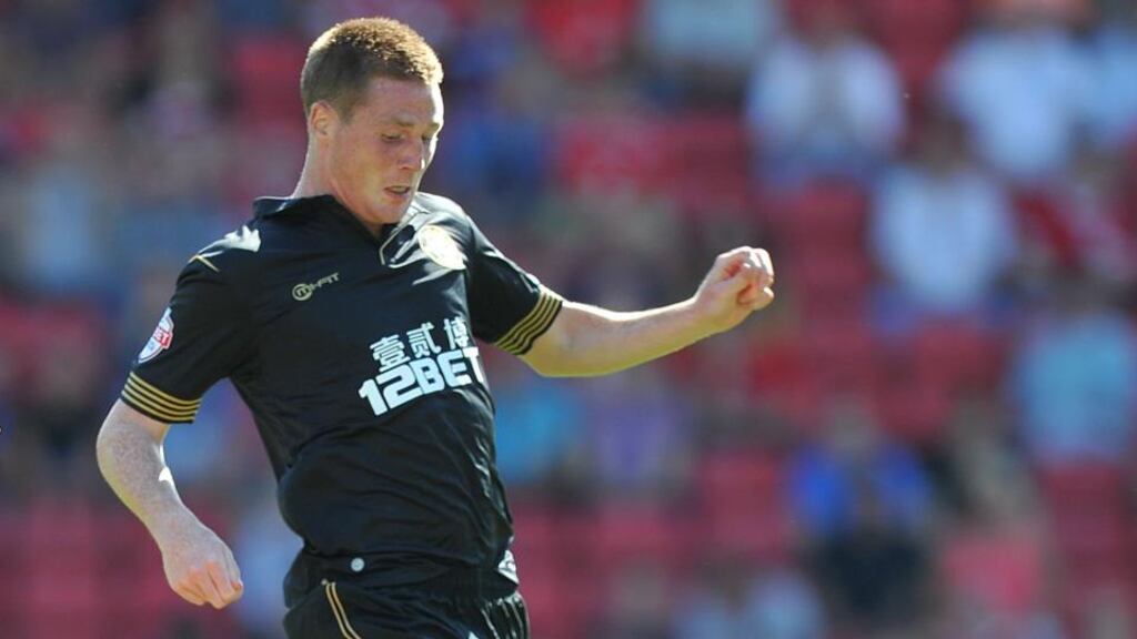 Wigan Athletic’s James McCarthy in action against Barnsley on Saturday. Photograph: Dave Howarth/PA Wire