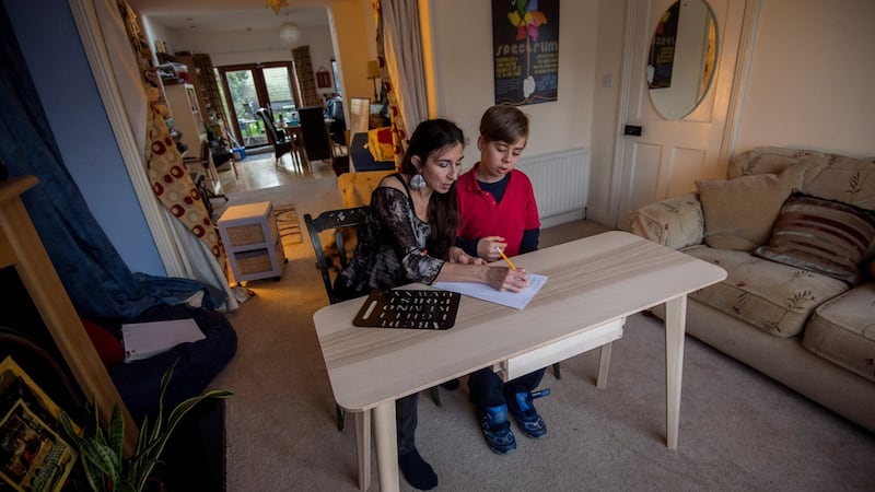 Adrienne Murphy with her son, Caoimh Connolly (13), at home in Rialto, Dublin. Photograph: Brenda Fitzsimons