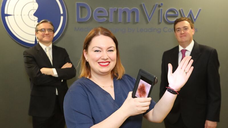 Nurse Nora Chiorascu, consultant dermatologist Dr Rupert Barry and DermView chief executive Eoin O’Reilly. Photograph: Sasko Lazarov