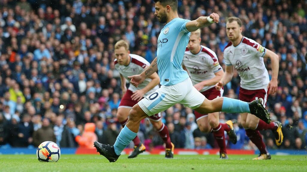 Sergio Aguero of Manchester City scores his side’s first goal against Burnley at Etihad Stadium. Photograph: Alex Livesey/Getty Images