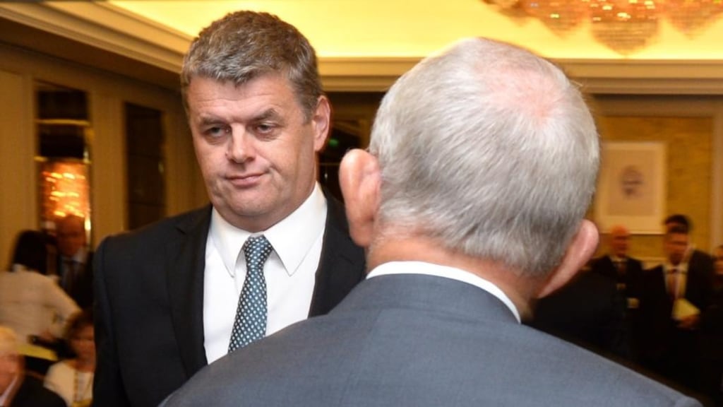 Robert Pitt, the then chief executive of INM, passes Leslie Buckley, the company’s then chairman, at the media group’s AGM in Dublin last August. Photograph: Dara Mac Dónaill