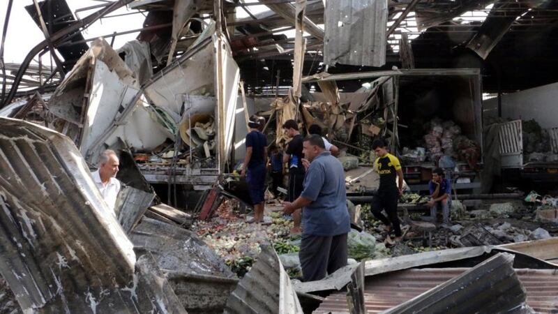 Iraqi police said a massive truck bomb ripped through the busy Jamila food market in Sadr City. Photograph: Ahmed Ali/EPA