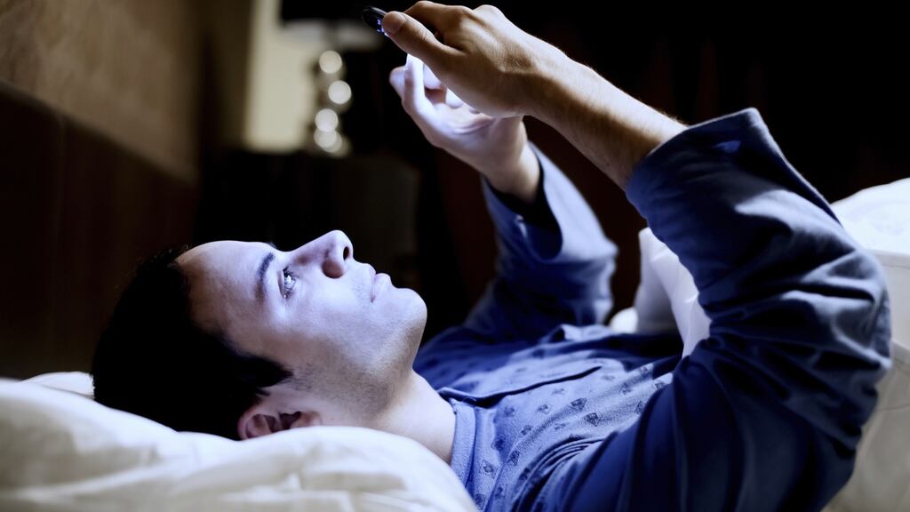 Light throws the body’s circadian rhythm out of whack so switch off your phone before bed. Photograph: Thinkstock