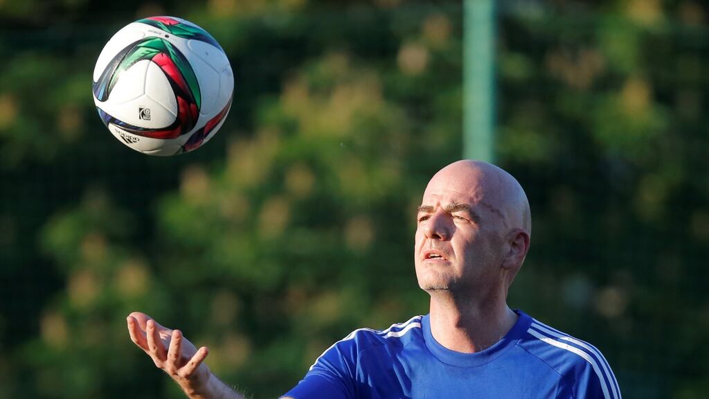 Fifa president Gianni Infantino plays with a ball during a friendly soccer match between 2018 World Cup Organising Committee and Rosich-Starco team of Russian politicians and pop stars in Moscow, on June 1st. Photograph: Maxim Shemetov/Reuters