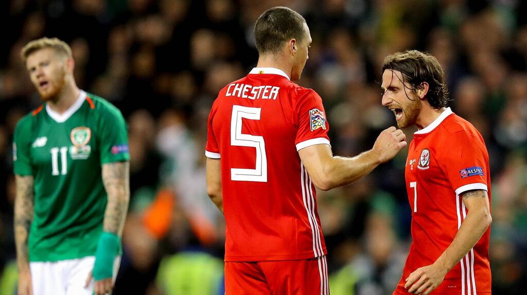 Wales’ James Chester and Joe Allen celebrate beating Ireland in Dublin in the Nations League in 2018. Photograph: Ryan Byrne/Inpho