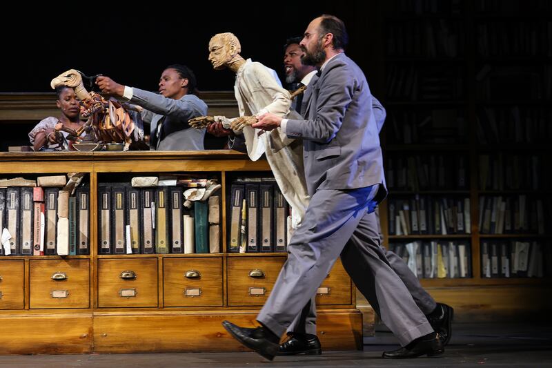 A performance extract from Handspring Puppet Company’s reworking this year of its production directed by William Kentridge, Faustus in Africa, at the Lyceum Theatre  in Edinburgh, Scotland. The company presents a reimagining of Faust's downfall, framed to confront the catastrophic costs of colonialism and the climate emergency. Photograph: Jeff J Mitchell/Getty