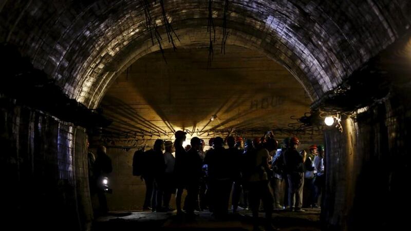 Journalists visit underground tunnels, which are part of the Nazi Germany “Riese” construction project, under the Ksiaz castle in an area where the Nazi train is believed to be. Photograph: Kacper Pempel/Reuters