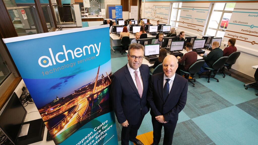 Invest NI chief executive Alastair Hamilton  with John Harkin, director and founder of Alchemy. Photograph: Kelvin Boyes/Press Eye