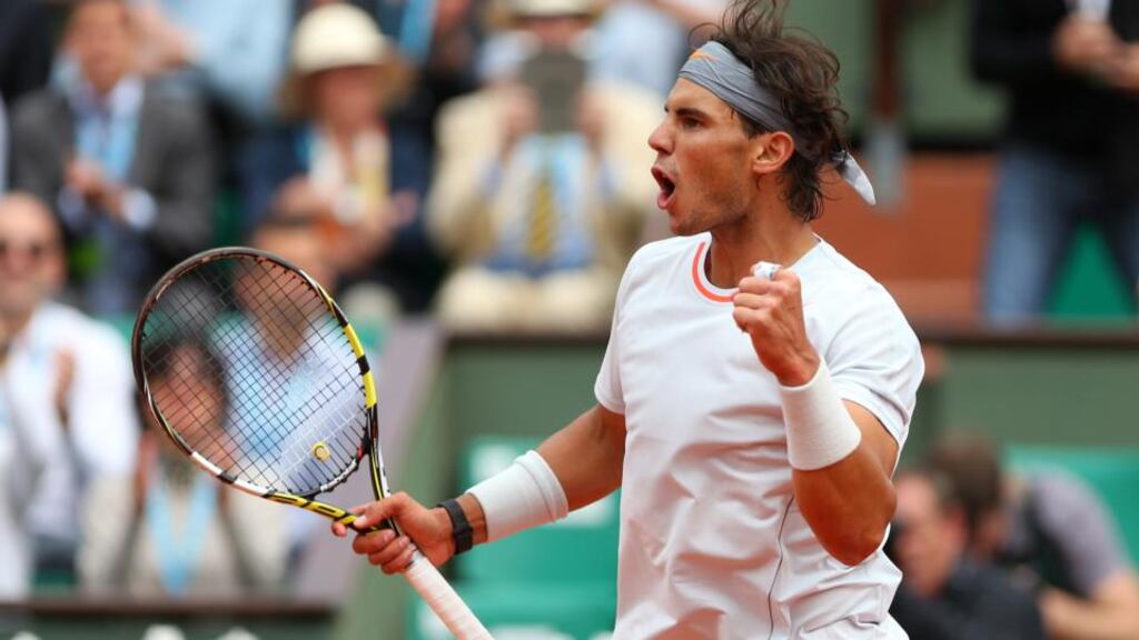 Rafael Nadal celebrates match point in his match against Daniel Brands of Germany during day two of the French Open at Roland Garros in Paris. Photograph: Getty Images