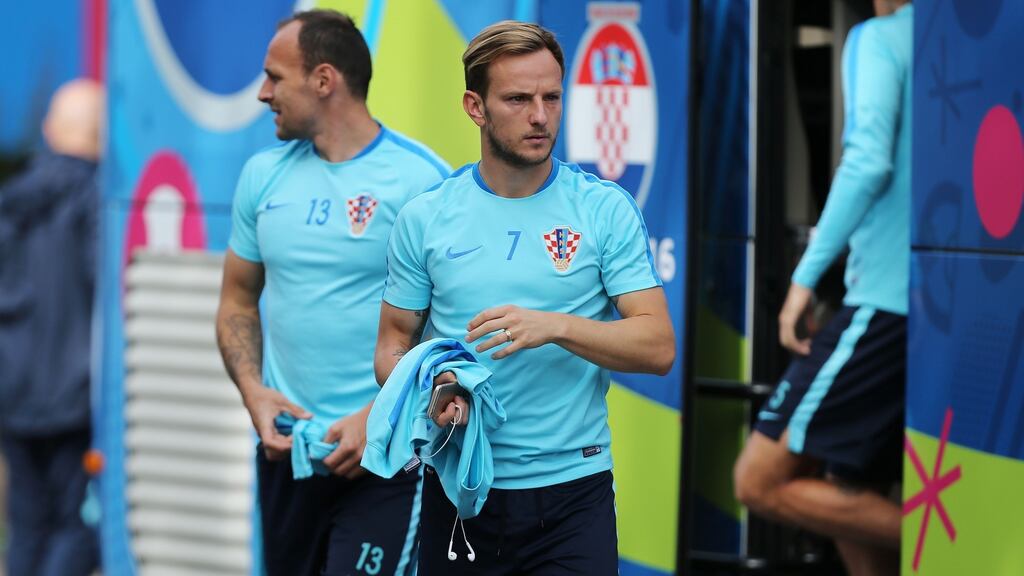 Ivan Rakitic will come up against a number of his Barcelona team mates when Croatia play Spain on Tuesday night. Photograph: Afp