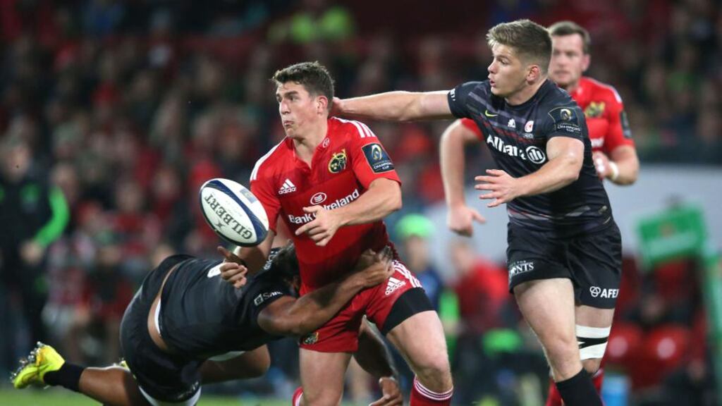 Munster’s Ian Keatley passes the ball as Saracens’ Owen Farrell moves in. The two sides meet again this weekend in the European Champions Cup. Photograph: INPHO/Billy Stickland