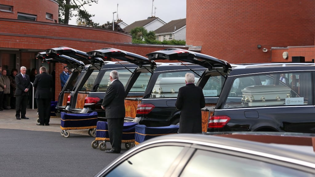 The removal of Thomas, Sylvia, Christopher, Jim and Mary Connors at the Church of the Ascension of the Lord, Balally, Dublin. Photograph: Colin Keegan/Collins