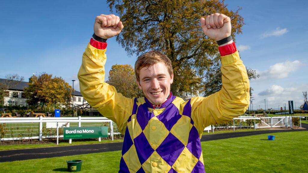 Colin Keane celebrates taking the record of most wins in an Irish Flat season after winning on Power Under Me at the Curragh on Sunday. Photograph: Morgan Treacy/Inpho