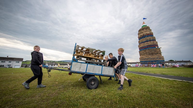 The ‘precarious lean’ of the bonfire at the loyalist Craigyhill housing estate in Larne. Photograph: Liam McBurney/PA Wire