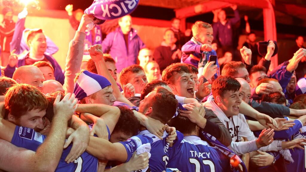 Limerick players celebrate with their fans after beating Sligo Rovers 3-2 to earn a play-off place. Photo: Cathal Noonan/Inpho
