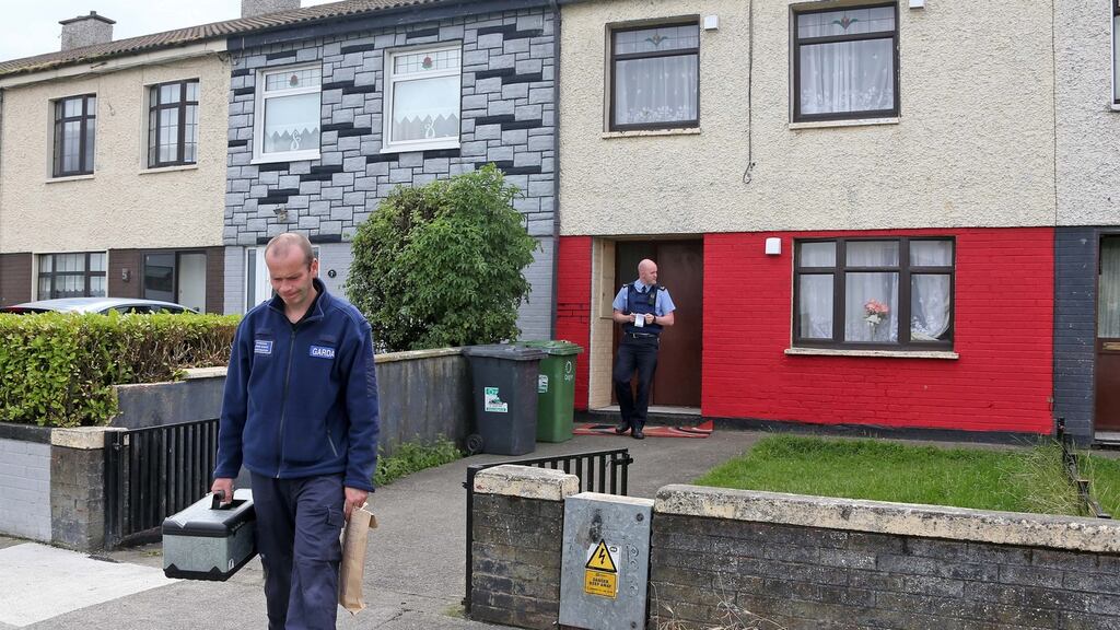 Gardaí at the scene on Belcamp Green, Coolock this morning where a man was stabbed with what is believed to be a broken bottle or glass in a house shortly after midnight last night. Photograph: Colin Keegan/ Collins Dublin