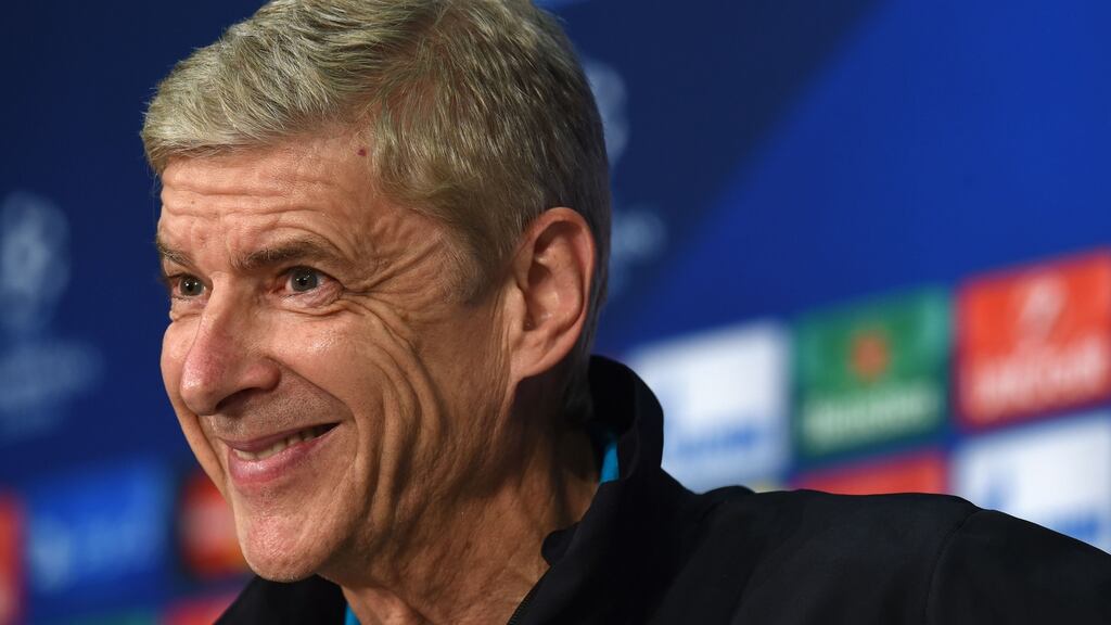 Arsenal’s French head coach Arsene Wenger laughs during a press conference on the eve of their Champions League Group F match against Bayern Munich. Photograph: Getty Images