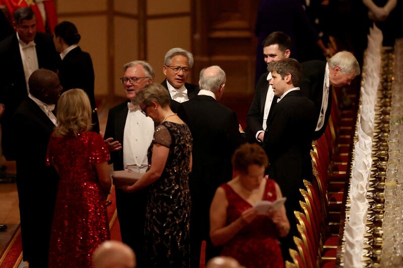 OpenAI chief executive Sam Altman (right) and Nvidia chief executive Jensen Huang (centre) at the state banquet. Photograph: Phil Noble/PA Wire
