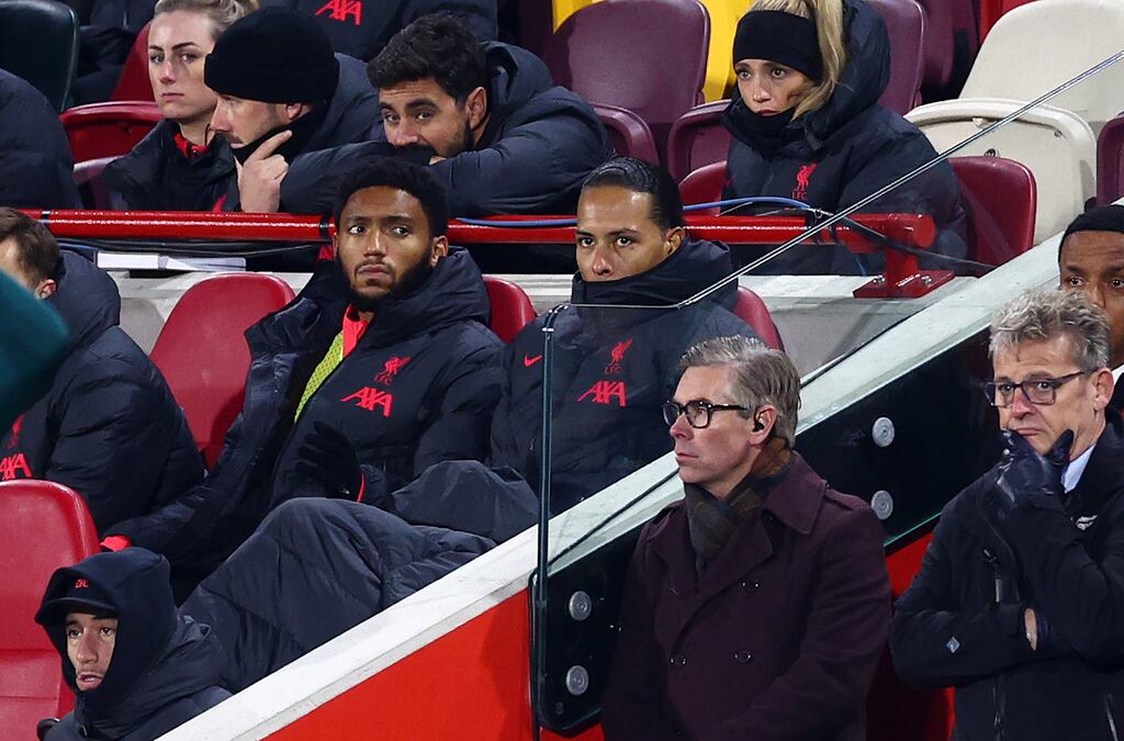 Virgil van Dijk watches the second half of Liverpool's 3-1 defeat at Brentford. Photograph: Clive Rose/Getty Images