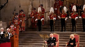 Britain’s King Charles tells parliament he will follow his mother’s example