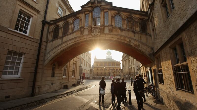Students walk under the Bridge of Sighs along New College Lane in Oxford. Photograph: Oli Scarff/Getty Images