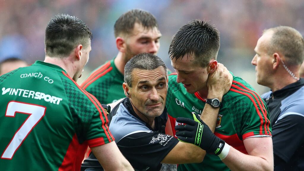 Mayo’s Cillian O’Connor has a word with side line official Maurice Deegan during the final moments the drawn final. Photograph: Cathal Noonan/Inpho