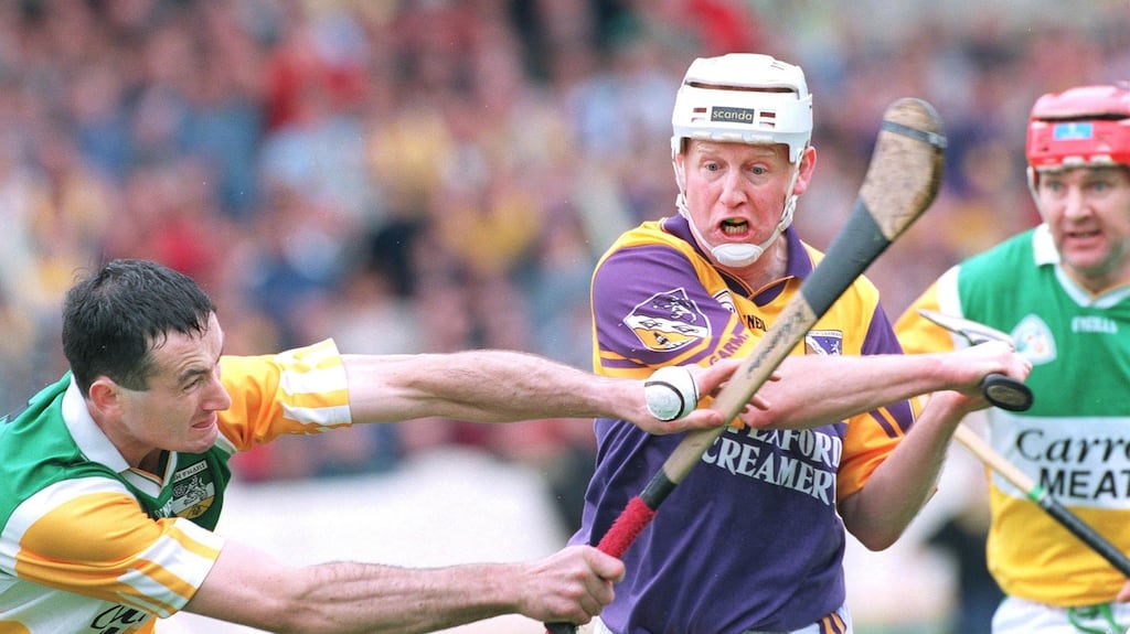 Wexford’s Tom Dempsey in action against Billy Dooley and Martin Hanamy of Offaly at Croke Park in June 1999. Photograph: Joe St Leger/The Irish Times