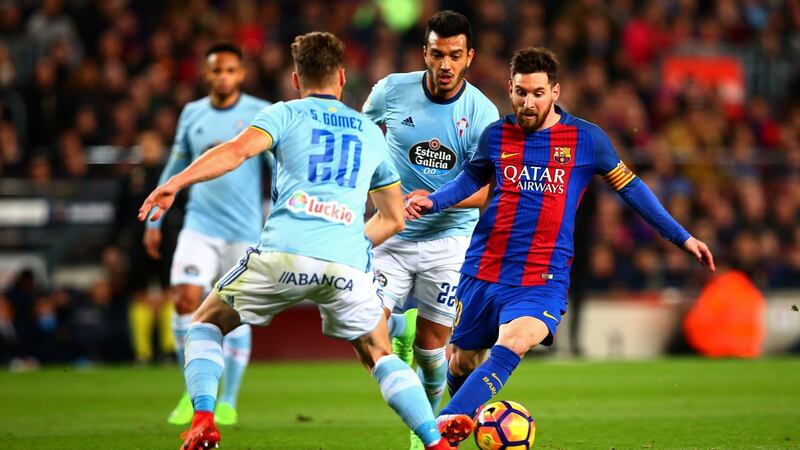 Lionel Messi runs past Sergi Gomez of Celta Vigo to score the opening goal of the game in their 5-0 win at the weekend. Photo: Dan Istitene/Getty Images