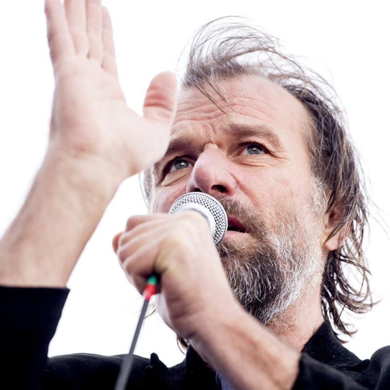 Dutch world record holder Wim Hof known as ‘The Ice Man’, speaks as as he tries to set a new world record for the longest and largest ice bath, on April 21, 2015 in Eindhoven. AFP PHOTO /ANP /KOEN VAN WEEL netherlands out - (Photo credit should read Koen van Weel/AFP via Getty Images)