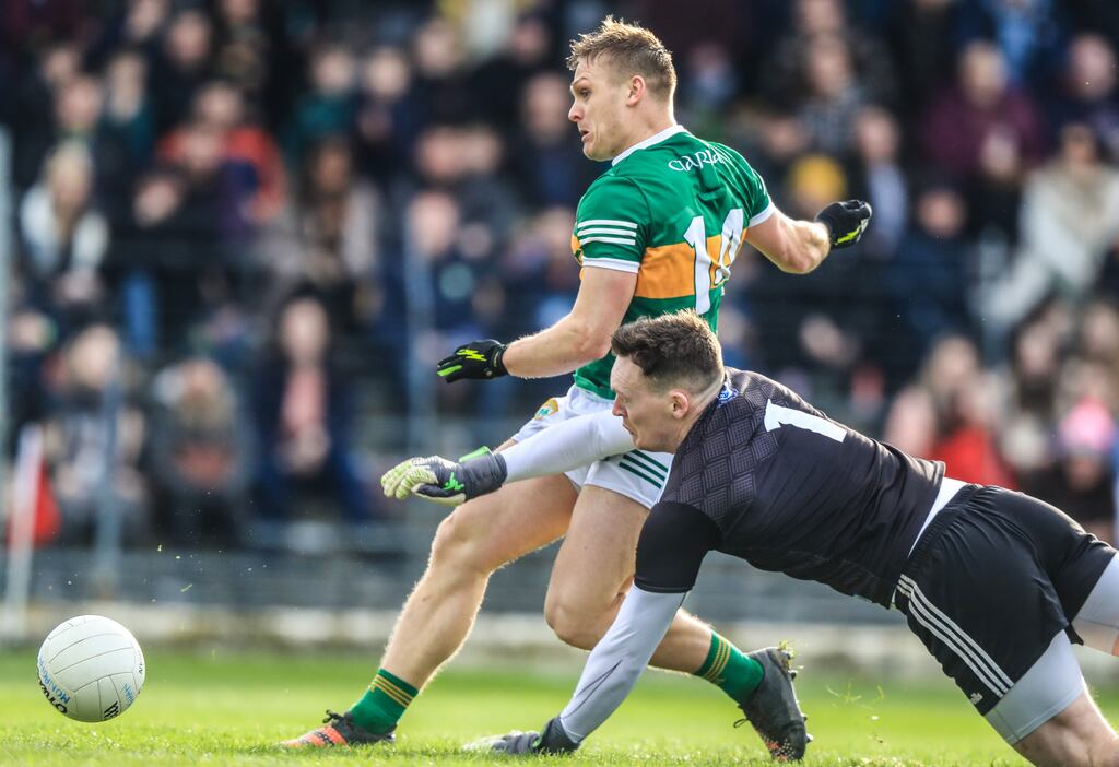 Kerry's Darragh Roche rounds Rory Beggan to score a goal in Killarney. Photograph: Evan Treacy/Inpho