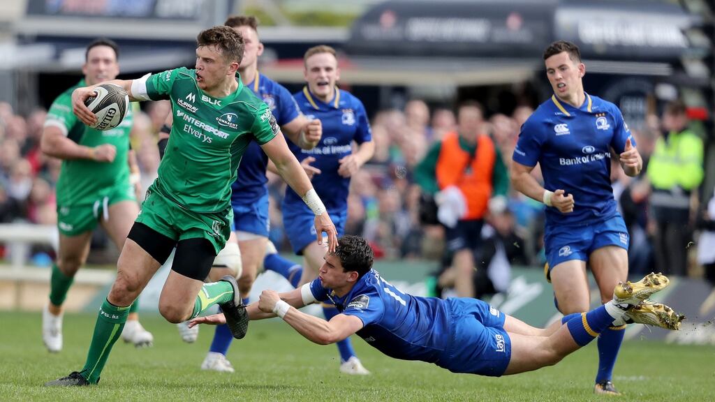 Connacht’s Tom Farrell with Joey Carbery of Leinster at the Sportsground. Photograph: ©INPHO/Dan Sheridan
