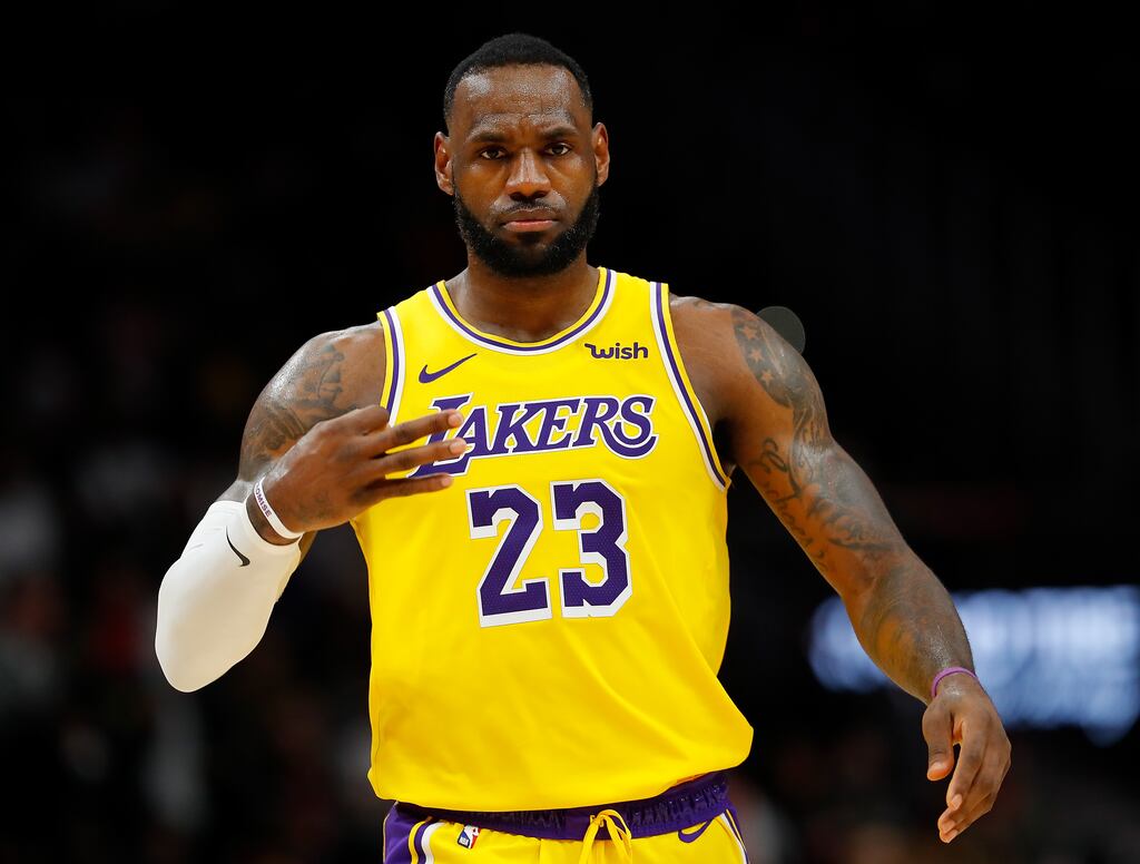 LeBron James of the Los Angeles Lakers reacts after hitting a three-point basket against the Atlanta Hawks at State Farm Arena in Atlanta, Georgia, in December 2019. Photograph: Kevin C Cox/Getty