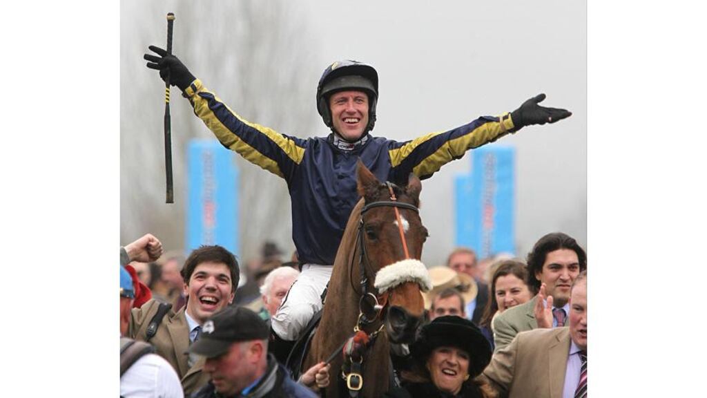 Robbie Power leads the celebrations after landing the RSA Chase on board Bostons Angel at Cheltenham. Photograph: David Davies/PA Wire