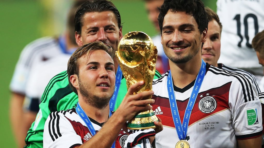 Mario Gotze holds the World Cup trophy after Germany beat Argentina in the final in 2014. Photo: Ian MacNicol/Getty Images